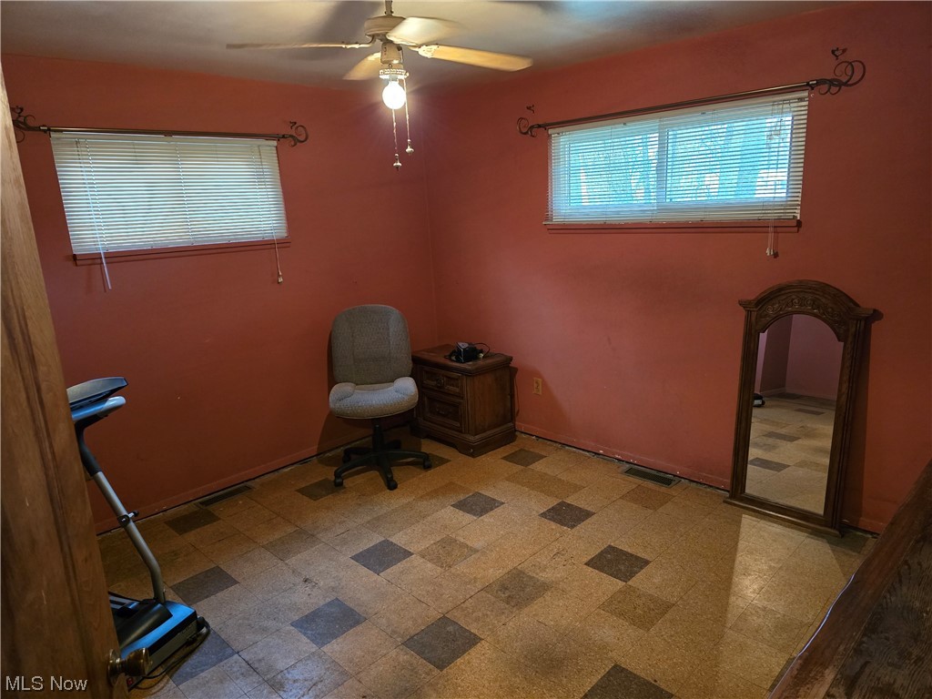 1450 Bonnie Road Macedonia, OH 44056 - Photo 15 of 21 Unfurnished office with light tile flooring and ceiling fan