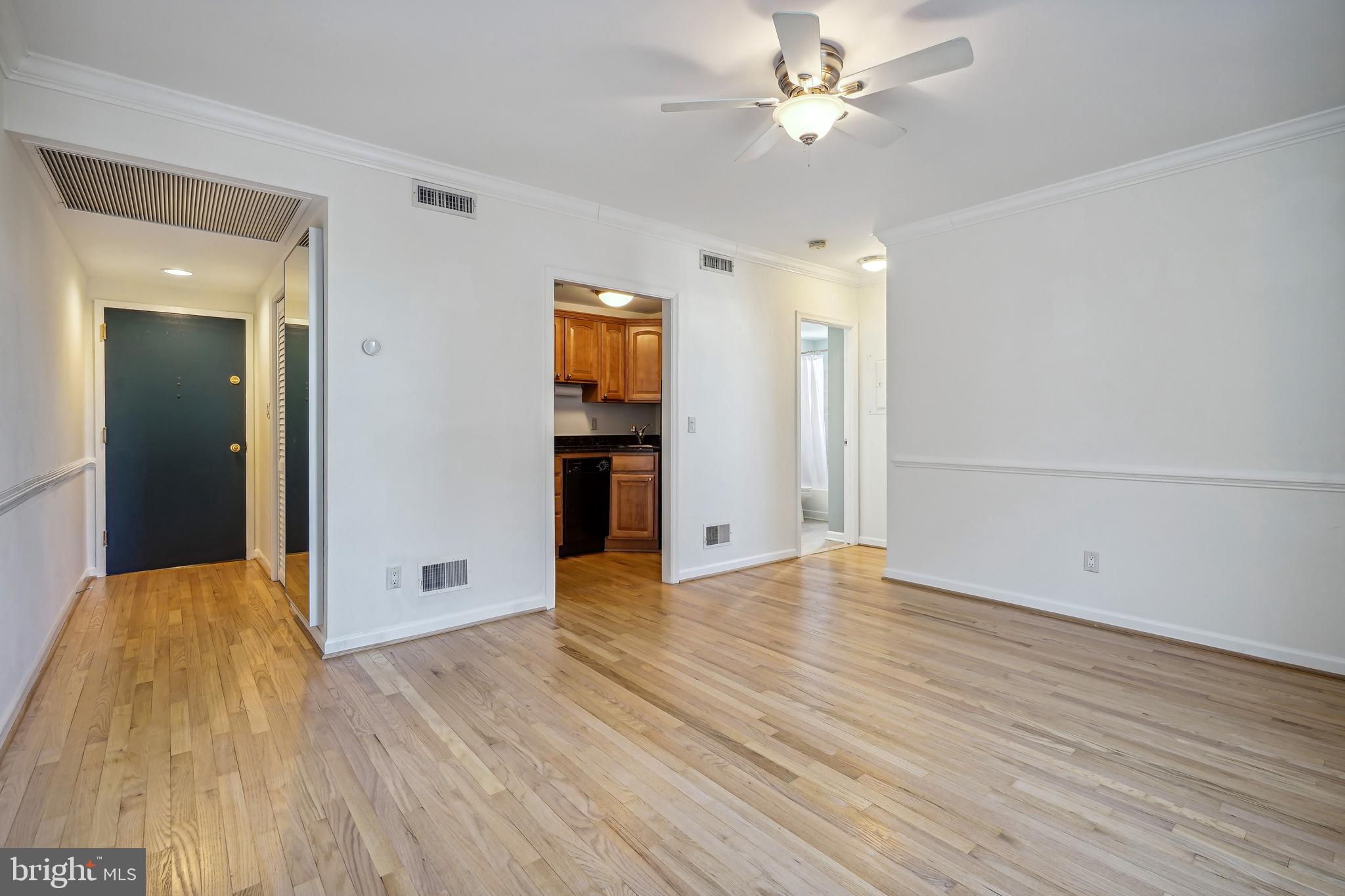 2611 Adams Mill Road Northwest, Unit 307 Washington, DC 20009 - Photo 5 of 16 Living room Kitchen
