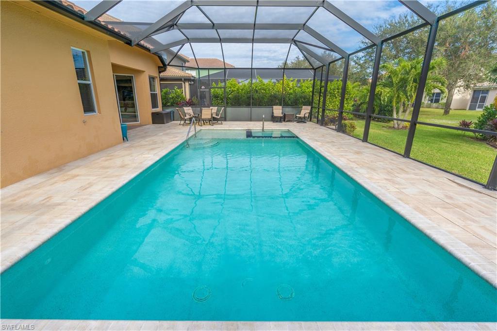 12414 Rock Ridge Lane Fort Myers, FL 33913 - Photo 33 of 48 a view of a backyard with sitting area