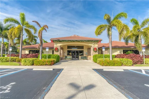 a view of a patio with table and chairs with potted plants