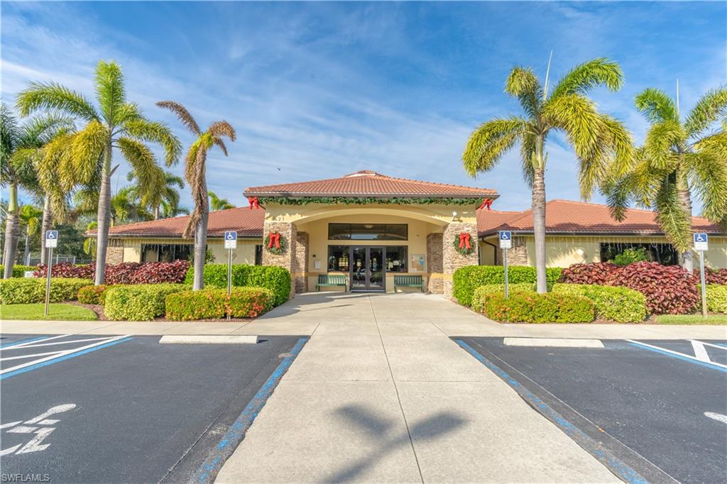12414 Rock Ridge Lane Fort Myers, FL 33913 - Photo 36 of 48 a view of a building with a garden
