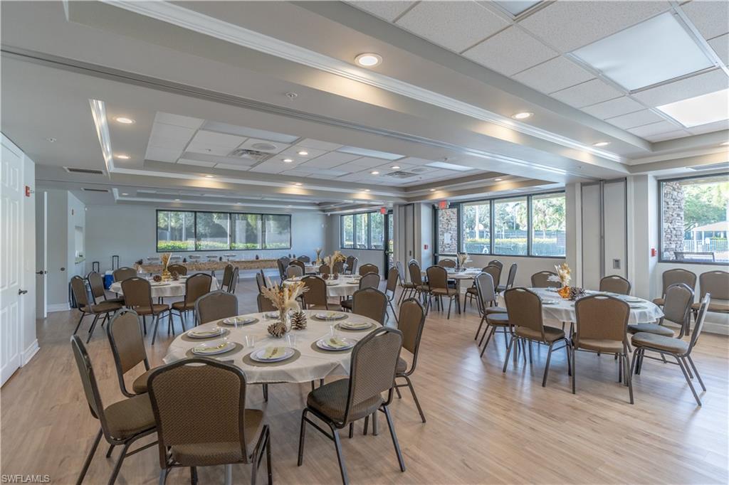 12414 Rock Ridge Lane Fort Myers, FL 33913 - Photo 38 of 48 a view of a dining room with furniture window and wooden floor