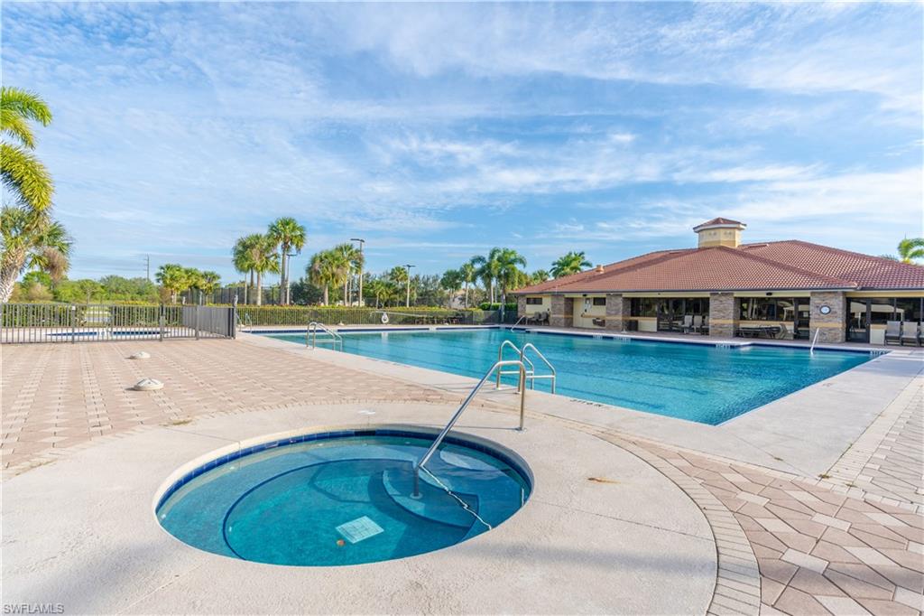 12414 Rock Ridge Lane Fort Myers, FL 33913 - Photo 41 of 48 a view of a swimming pool with a yard