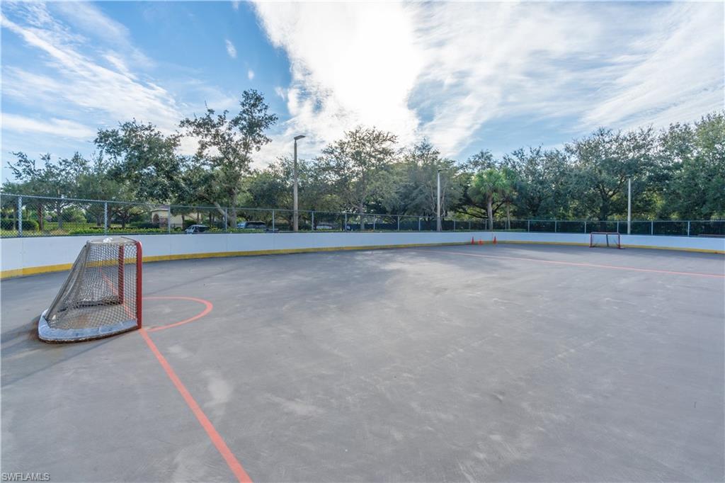12414 Rock Ridge Lane Fort Myers, FL 33913 - Photo 43 of 48 a view of a tennis court