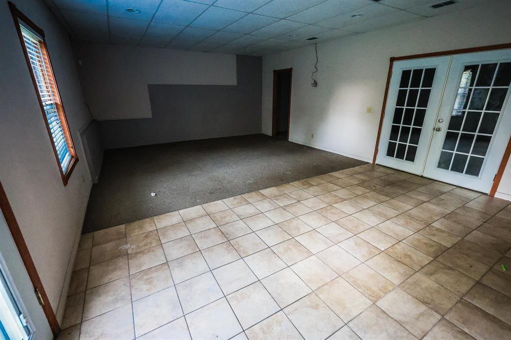 600 County Road 1503 Alba, TX 75410 - Photo 25 of 32 a view of an empty room with a window