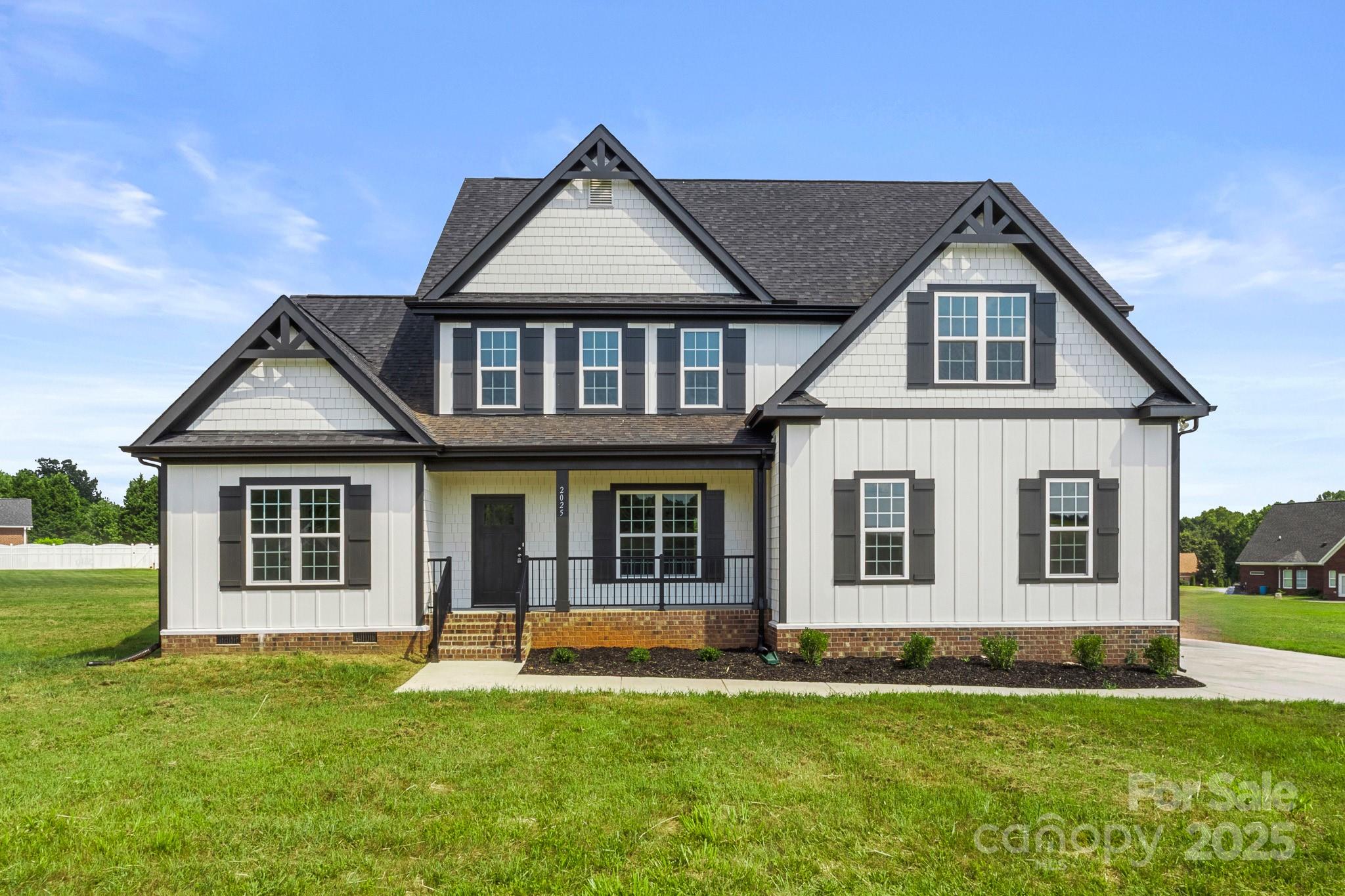 2025 Parks Road Salisbury, NC 28147 - Photo 1 of 47 a front view of a house with a yard