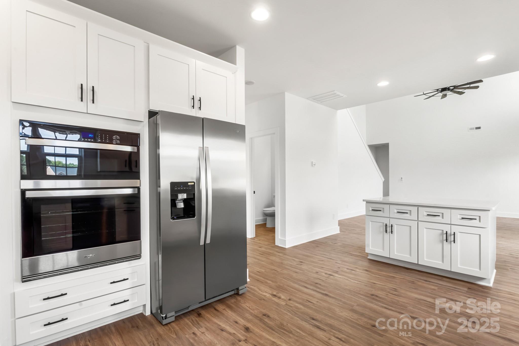 2025 Parks Road Salisbury, NC 28147 - Photo 15 of 47 a kitchen with stainless steel appliances a stove a microwave and a refrigerator