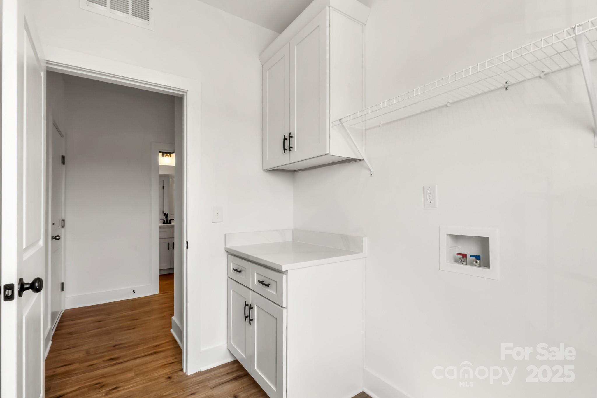 2025 Parks Road Salisbury, NC 28147 - Photo 18 of 47 a view of hallway with washer and dryer