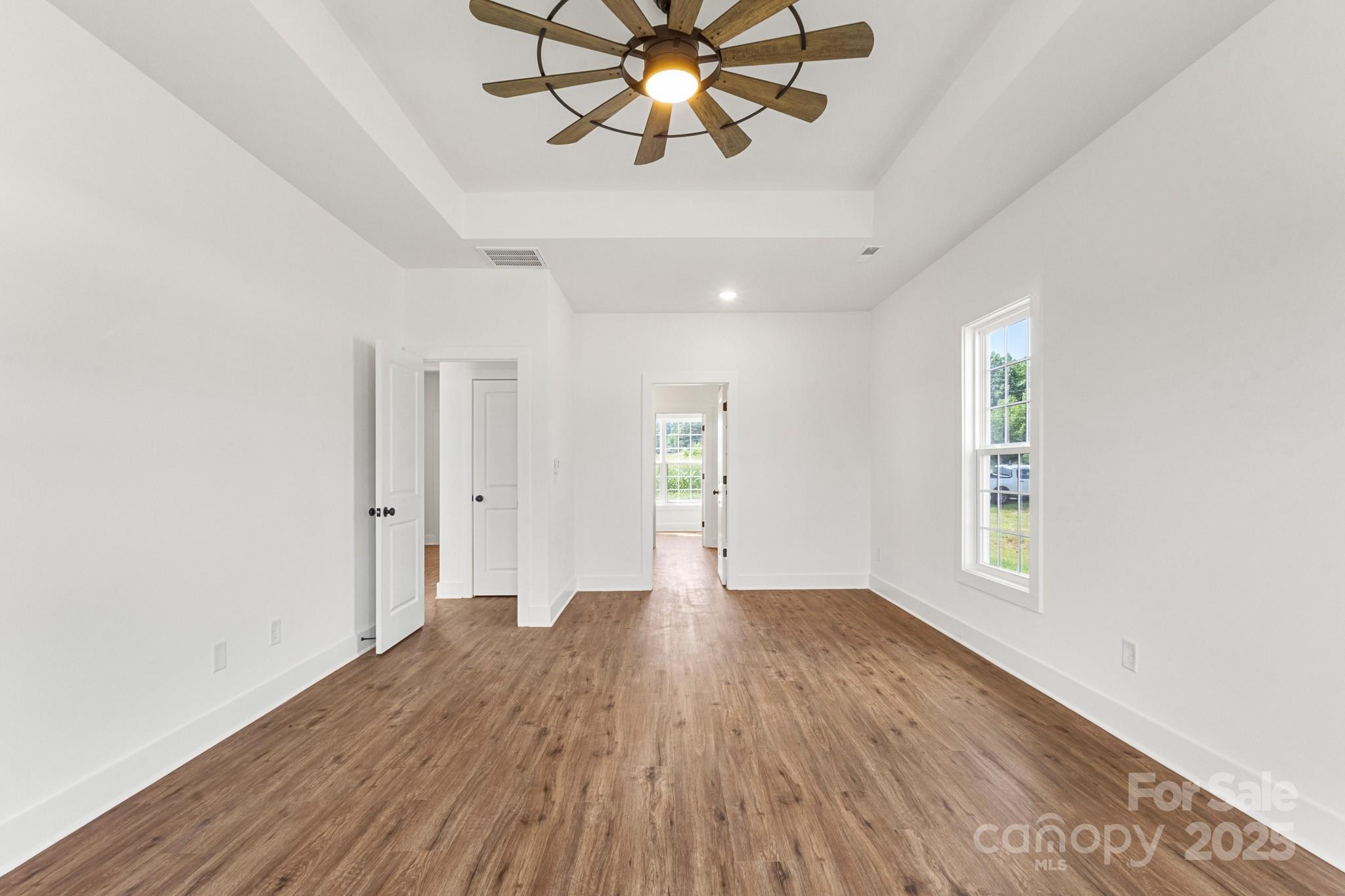 2025 Parks Road Salisbury, NC 28147 - Photo 20 of 47 wooden floor in an empty room with a window