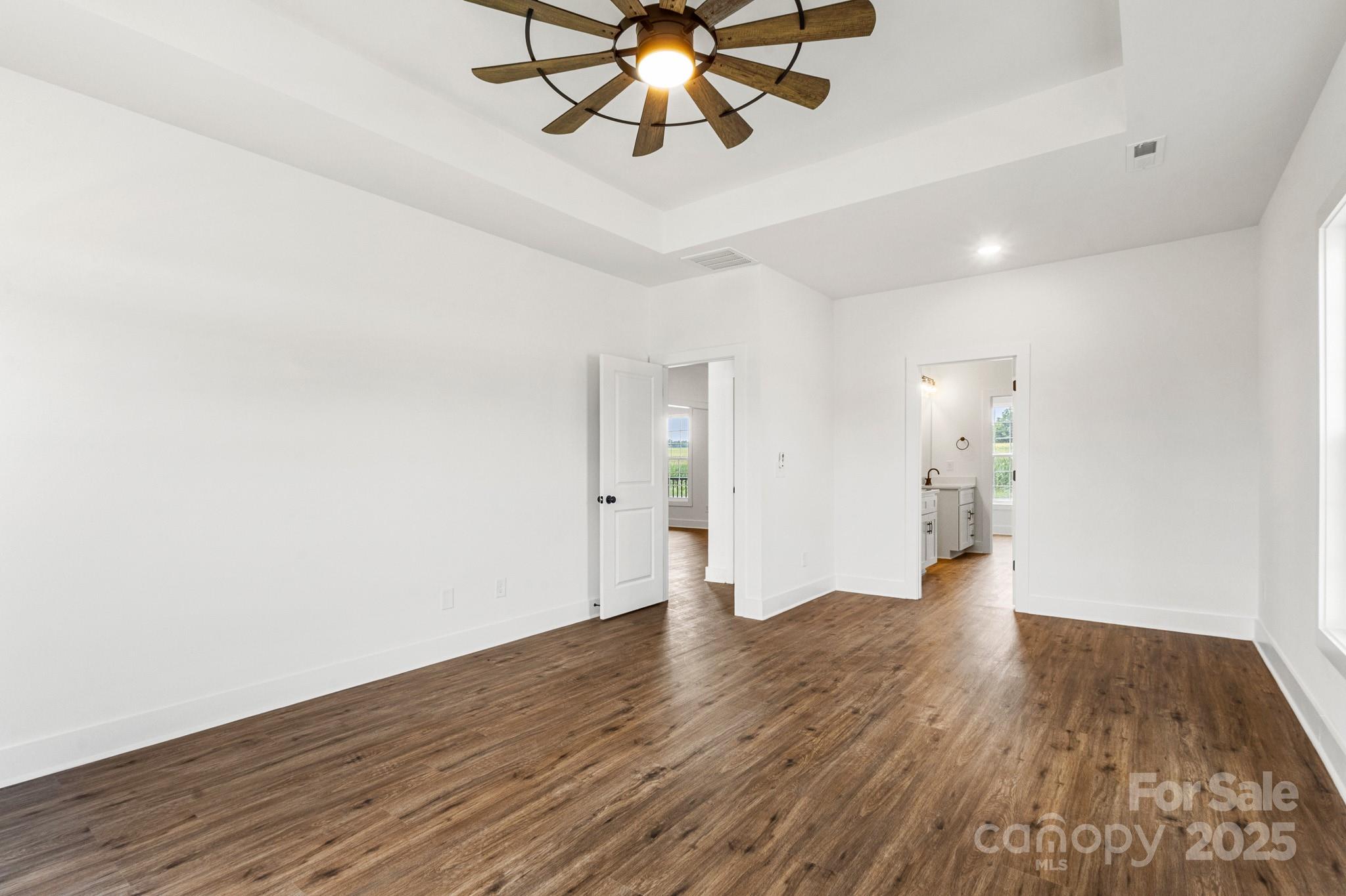 2025 Parks Road Salisbury, NC 28147 - Photo 21 of 47 a view of an empty room and wooden floor