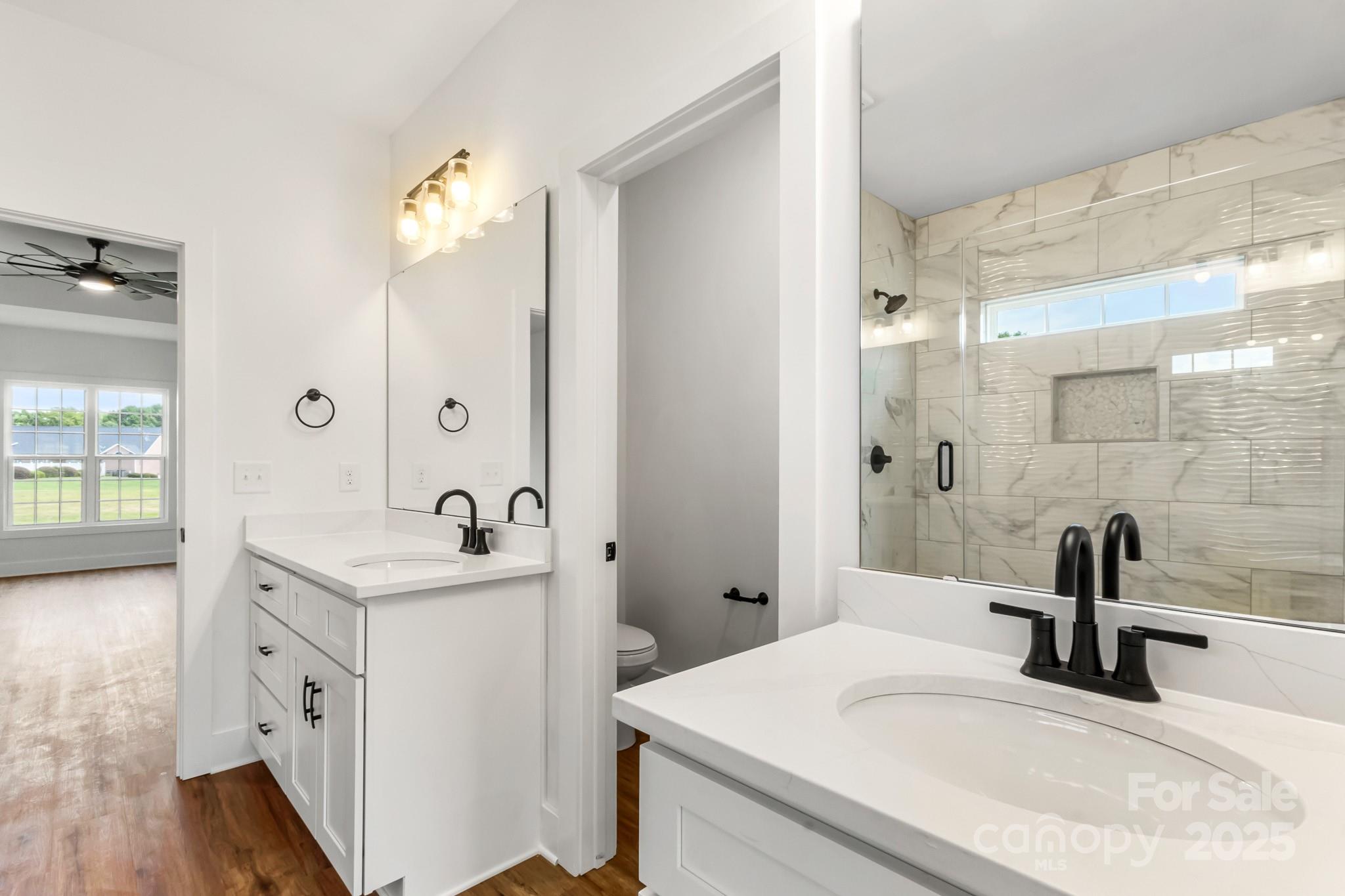 2025 Parks Road Salisbury, NC 28147 - Photo 23 of 47 a bathroom with a sink and a mirror