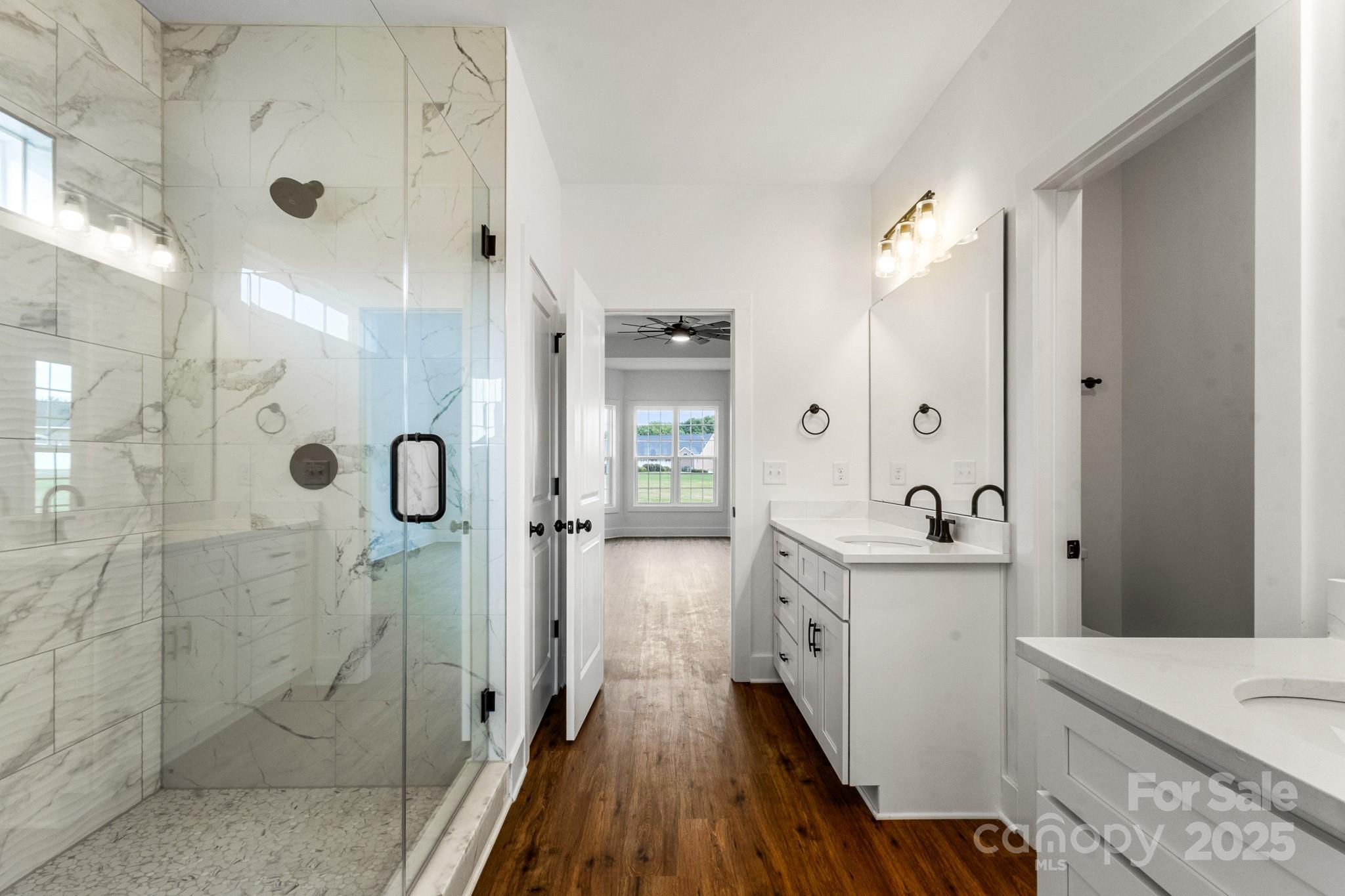 2025 Parks Road Salisbury, NC 28147 - Photo 24 of 47 a bathroom with a tub sink and shower