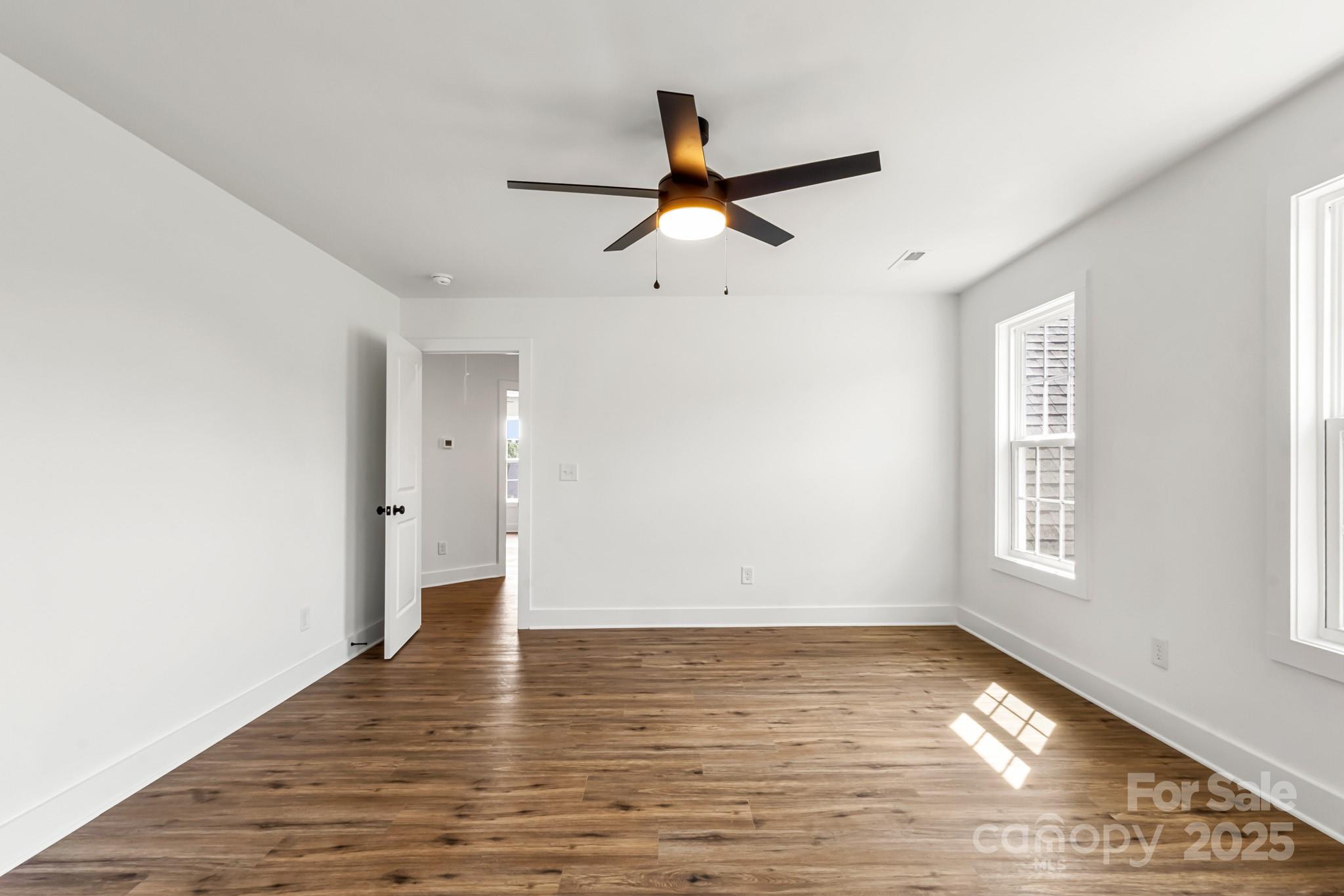 2025 Parks Road Salisbury, NC 28147 - Photo 33 of 47 a view of empty room with wooden floor and window