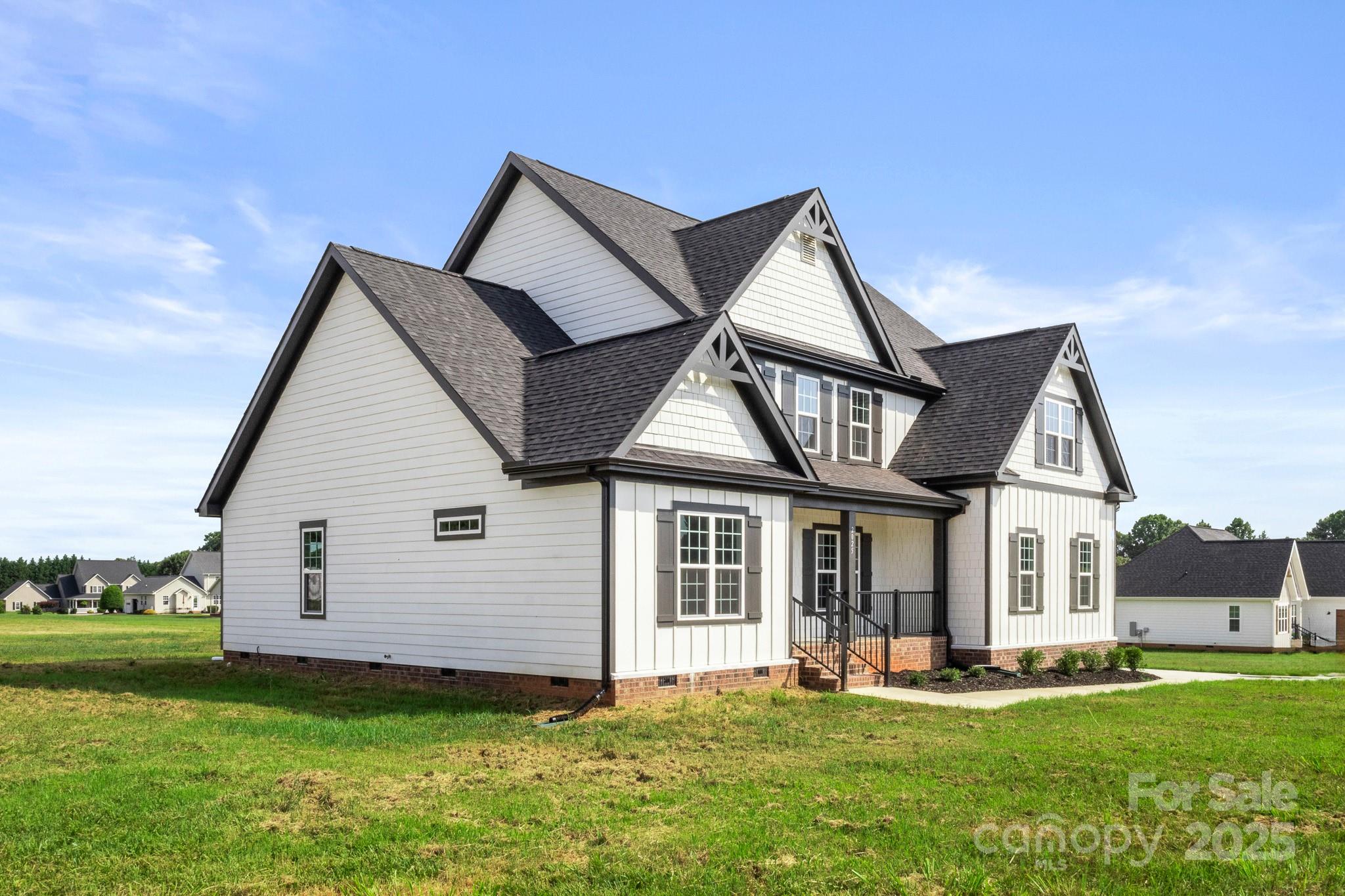 2025 Parks Road Salisbury, NC 28147 - Photo 45 of 47 a front view of a house with a yard and porch