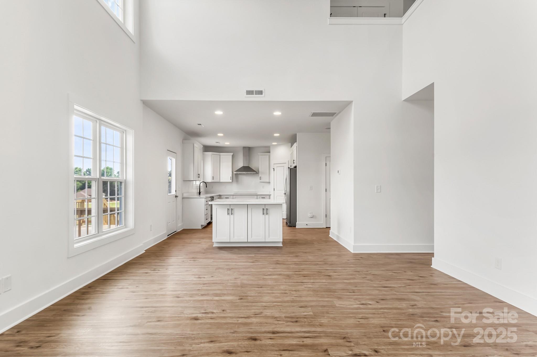 2025 Parks Road Salisbury, NC 28147 - Photo 7 of 47 a view of kitchen with wooden floor and electronic appliances