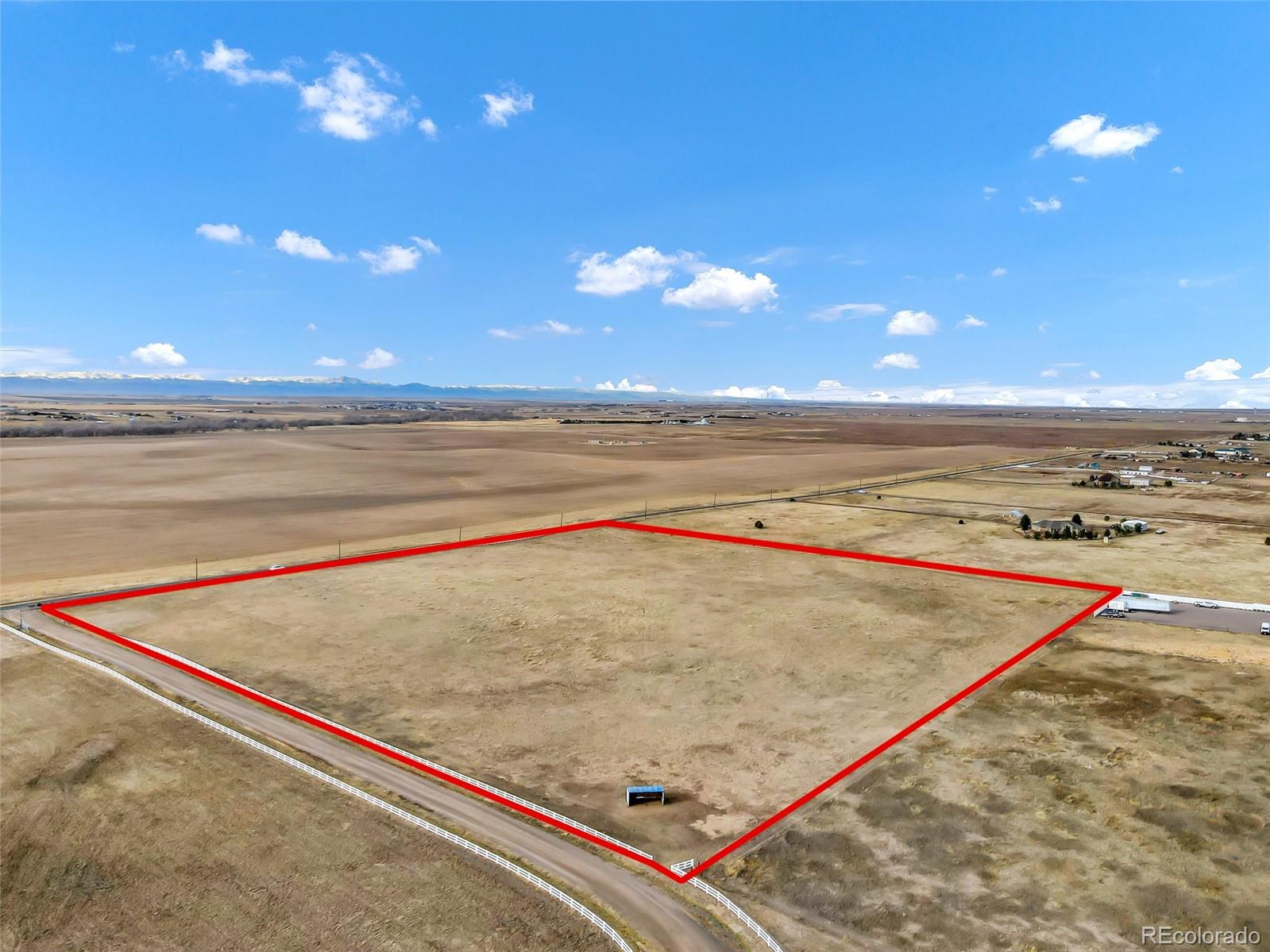 0 South Manila Road Bennett, CO 80102 - Photo 2 of 8 swimming pool with an outdoor space and seating area