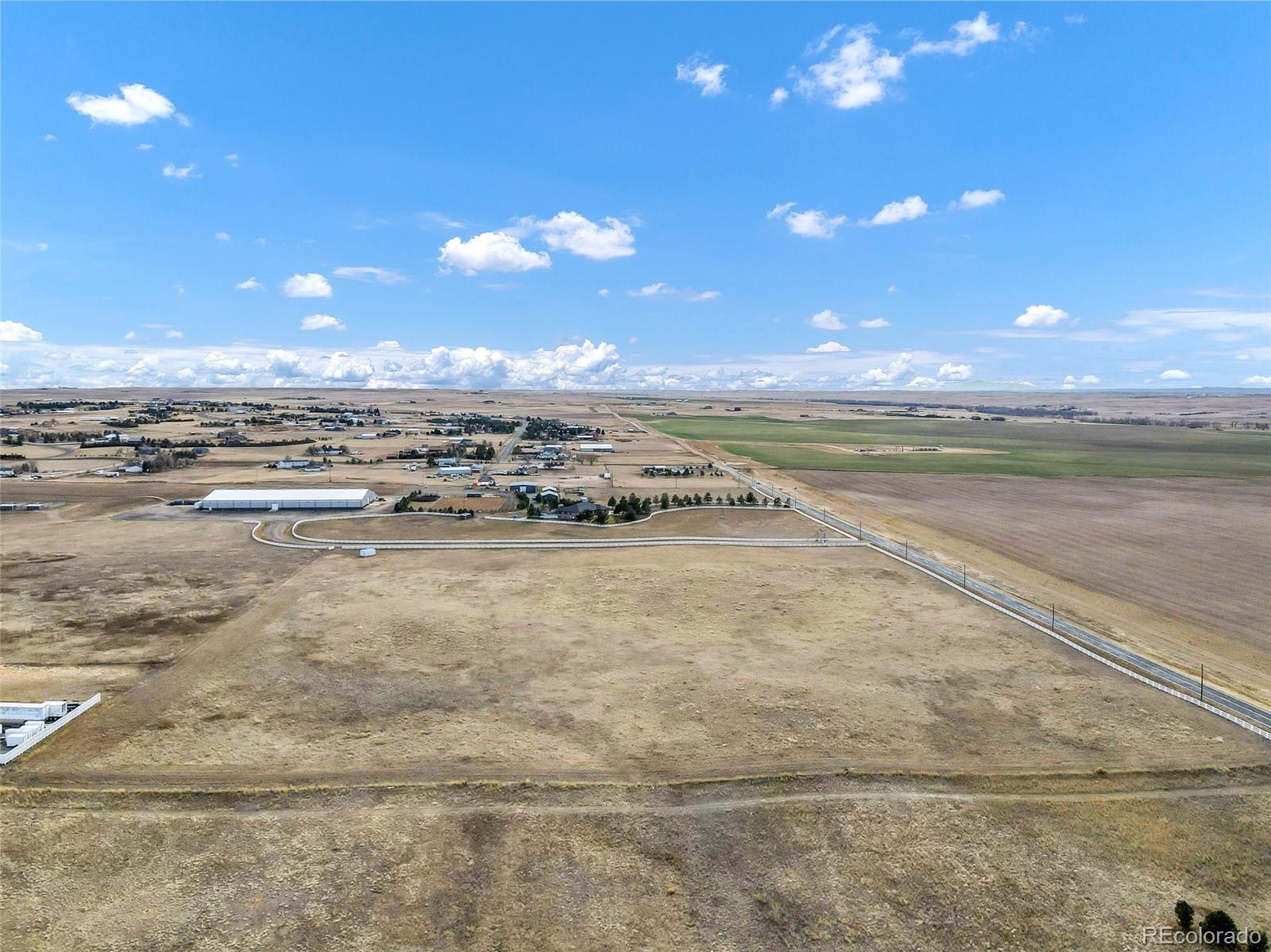 0 South Manila Road Bennett, CO 80102 - Photo 4 of 8 a view of an ocean beach and city