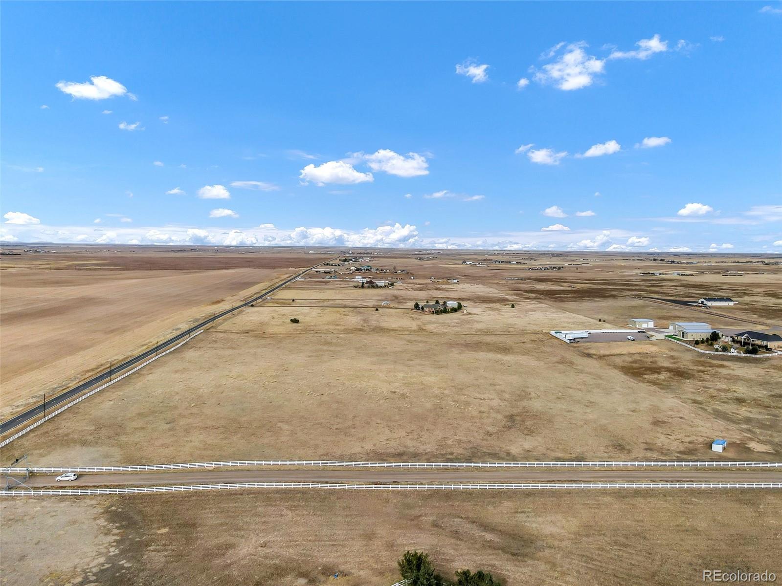 0 South Manila Road Bennett, CO 80102 - Photo 7 of 8 a view of an ocean and beach