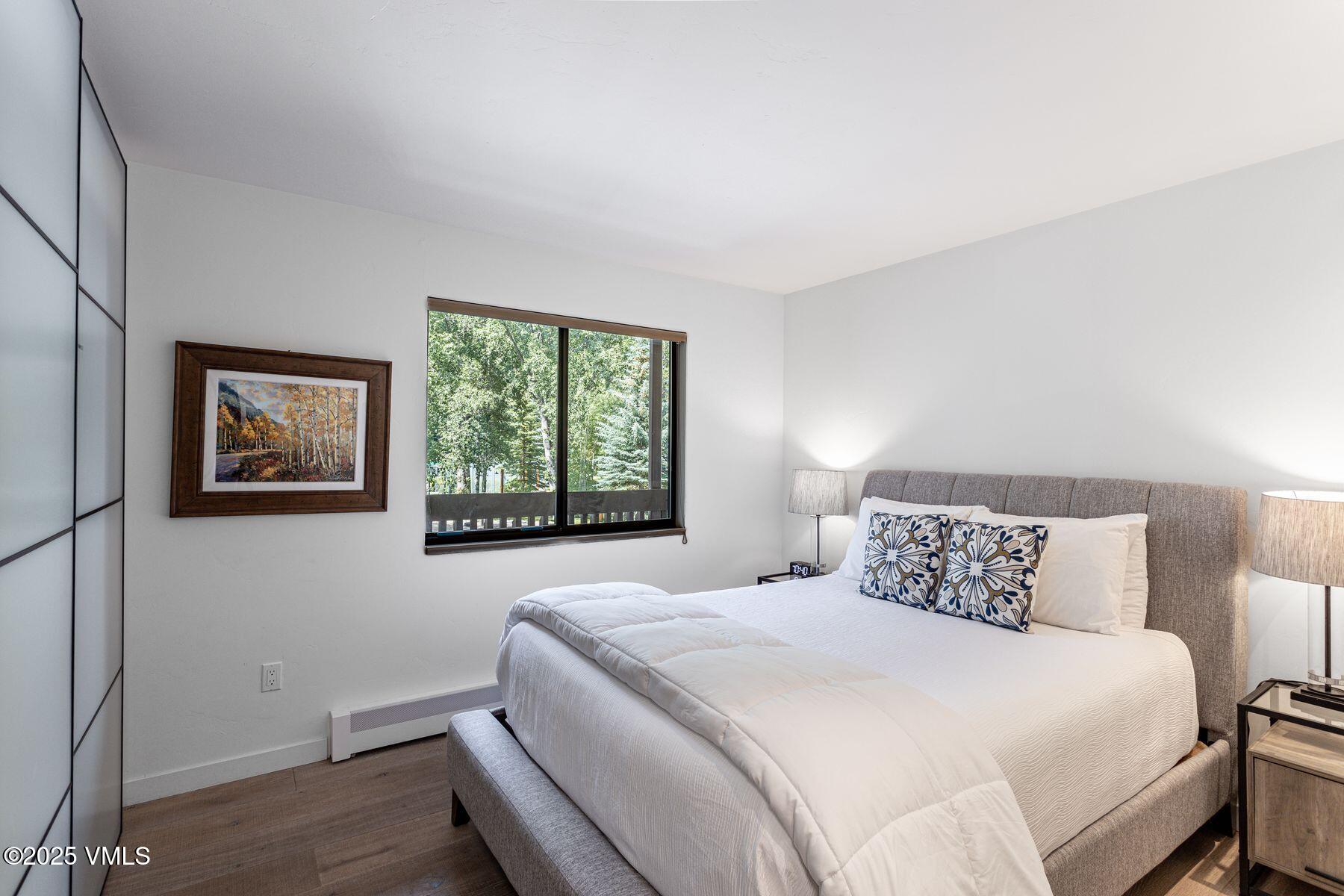 4630 Vail Racquet Club Drive, Unit 15 Vail, CO 81657 - Photo 5 of 20 a bedroom with a bed and a window