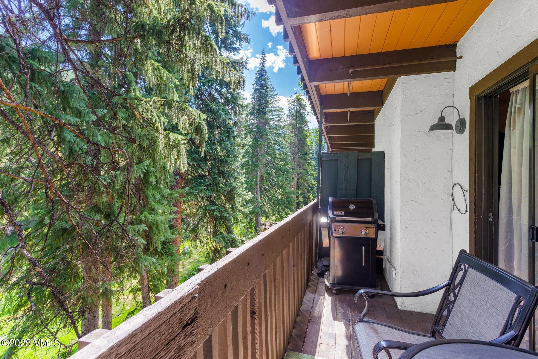 4630 Vail Racquet Club Drive, Unit 15 Vail, CO 81657 - Photo 8 of 20 a view of a balcony with chairs