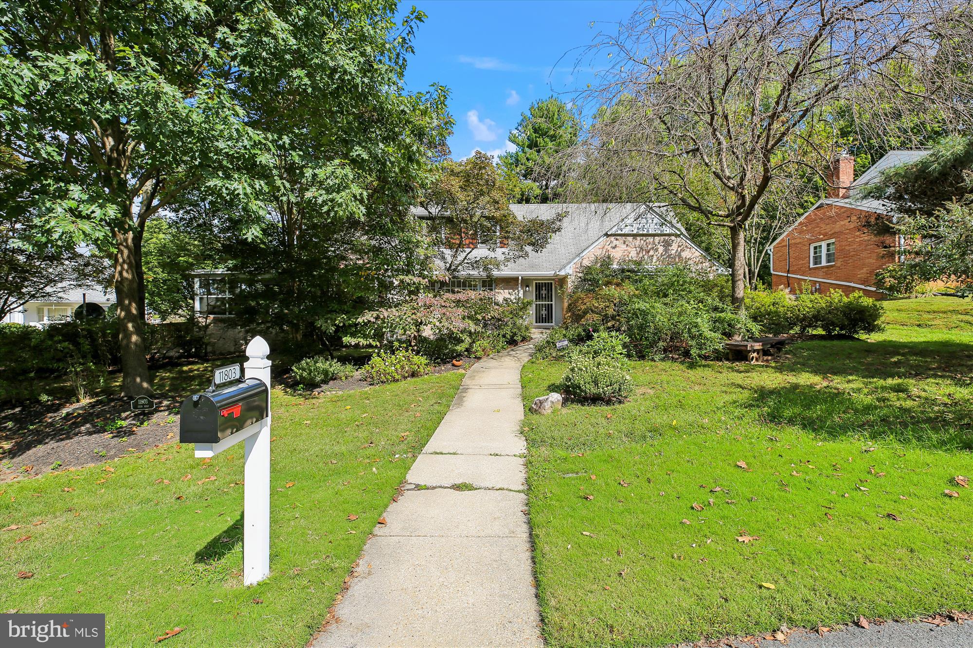 11803 Eden Road Silver Spring, MD 20904 - Photo 2 of 45 a front view of a house with a yard and trees