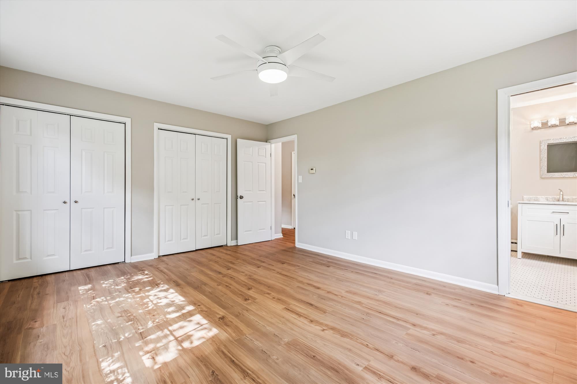 11803 Eden Road Silver Spring, MD 20904 - Photo 28 of 45 a view of empty room with wooden floor and fan