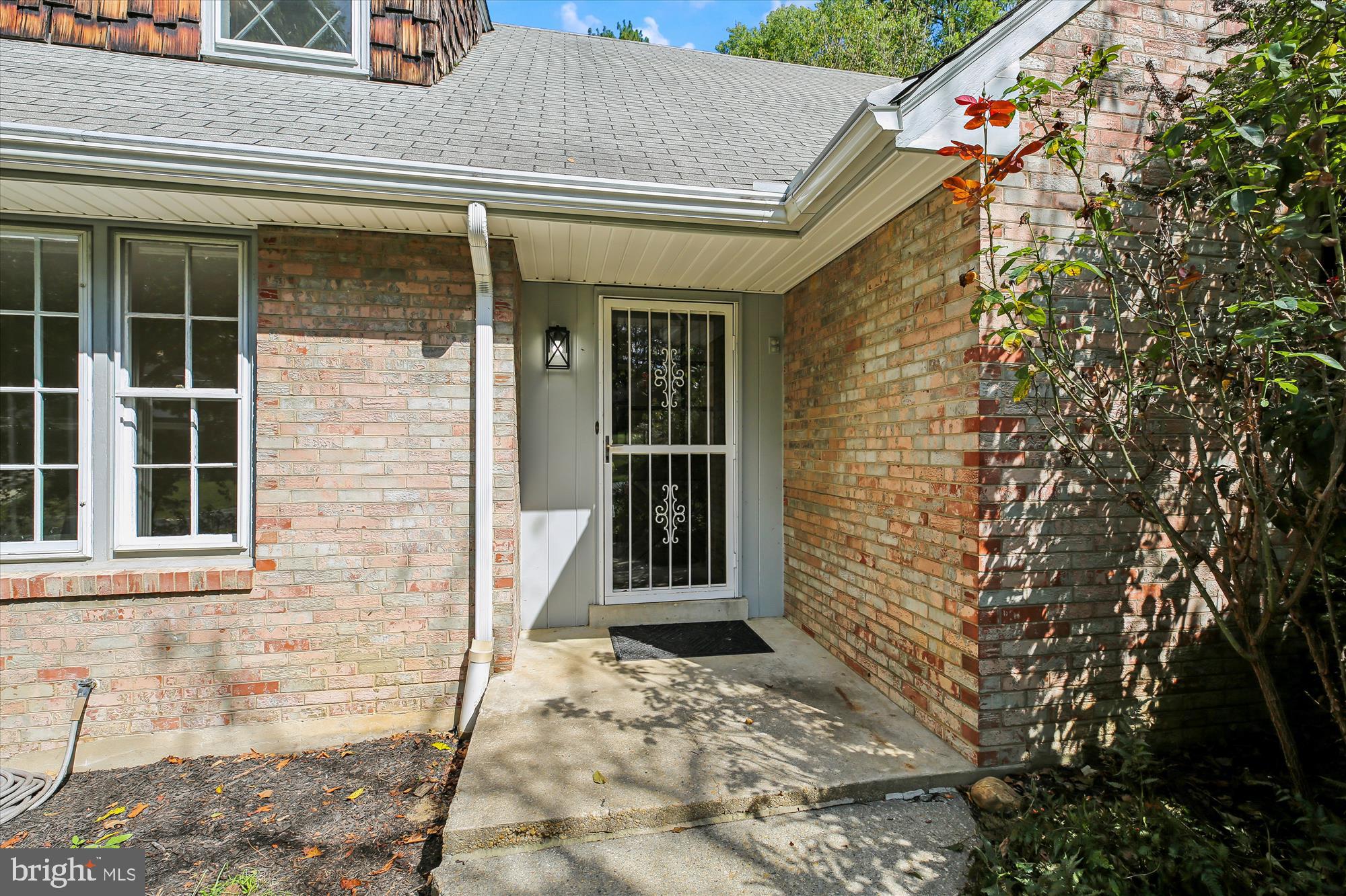 11803 Eden Road Silver Spring, MD 20904 - Photo 3 of 45 a view of a wooden door of the house