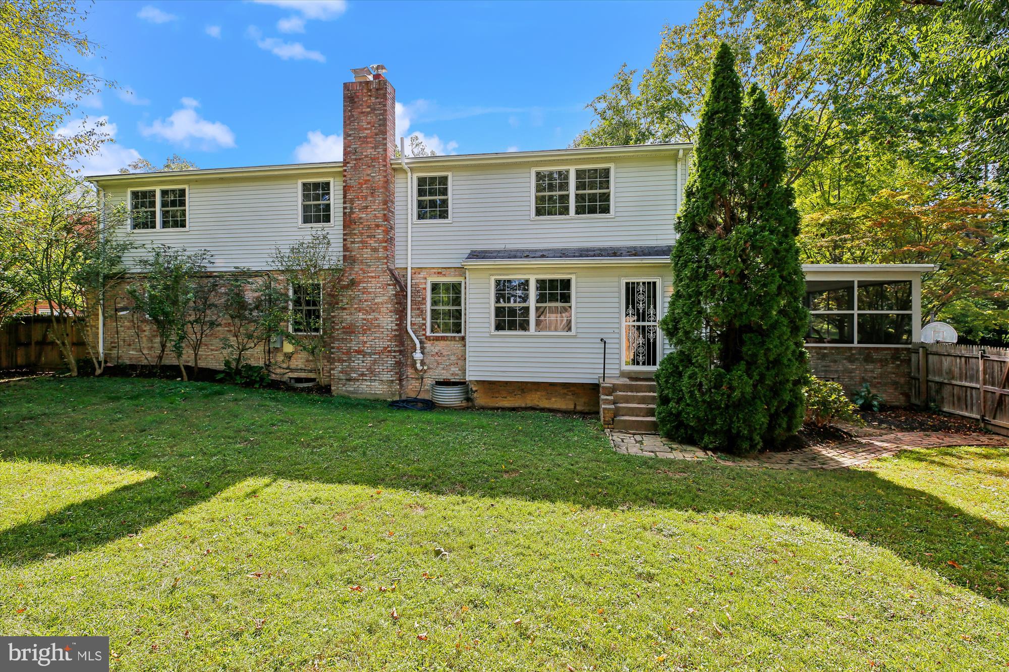 11803 Eden Road Silver Spring, MD 20904 - Photo 6 of 45 a front view of a house with a garden and yard