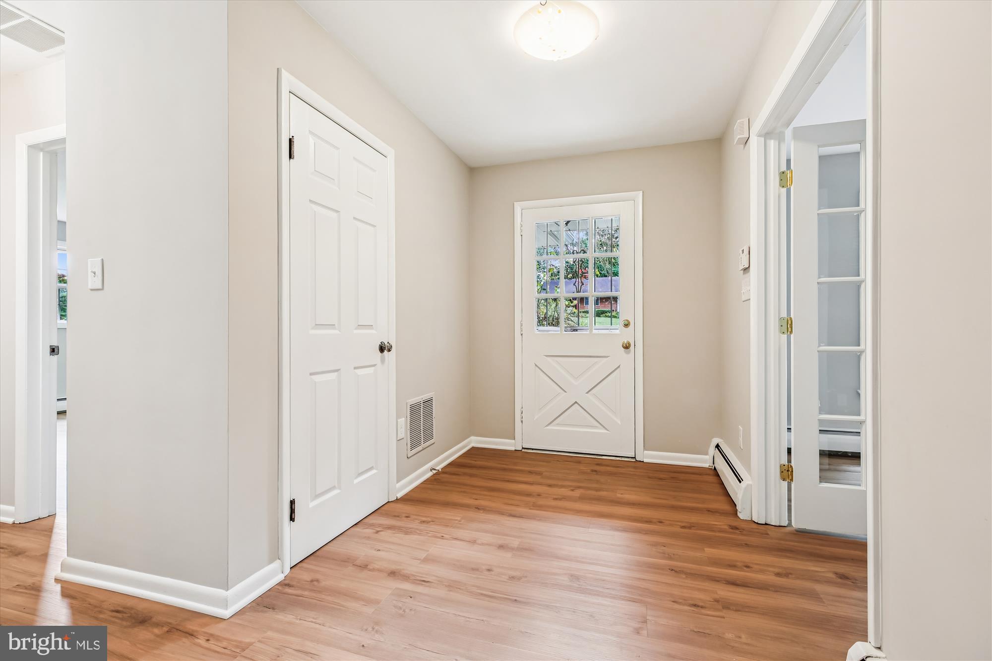 11803 Eden Road Silver Spring, MD 20904 - Photo 9 of 45 a view of empty room with wooden floor