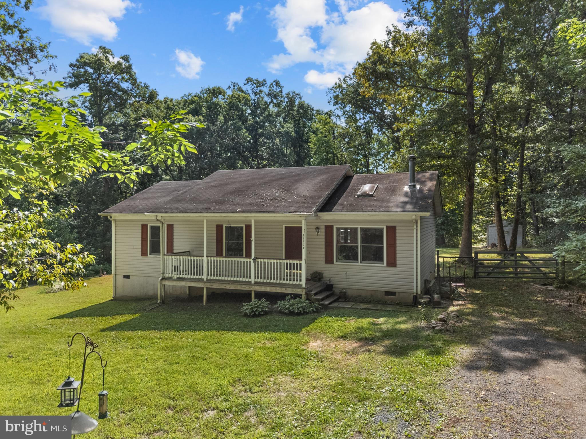 13175 Tower Road Unionville, VA 22567 - Photo 1 of 37 Charming home nestled in serene greenery.