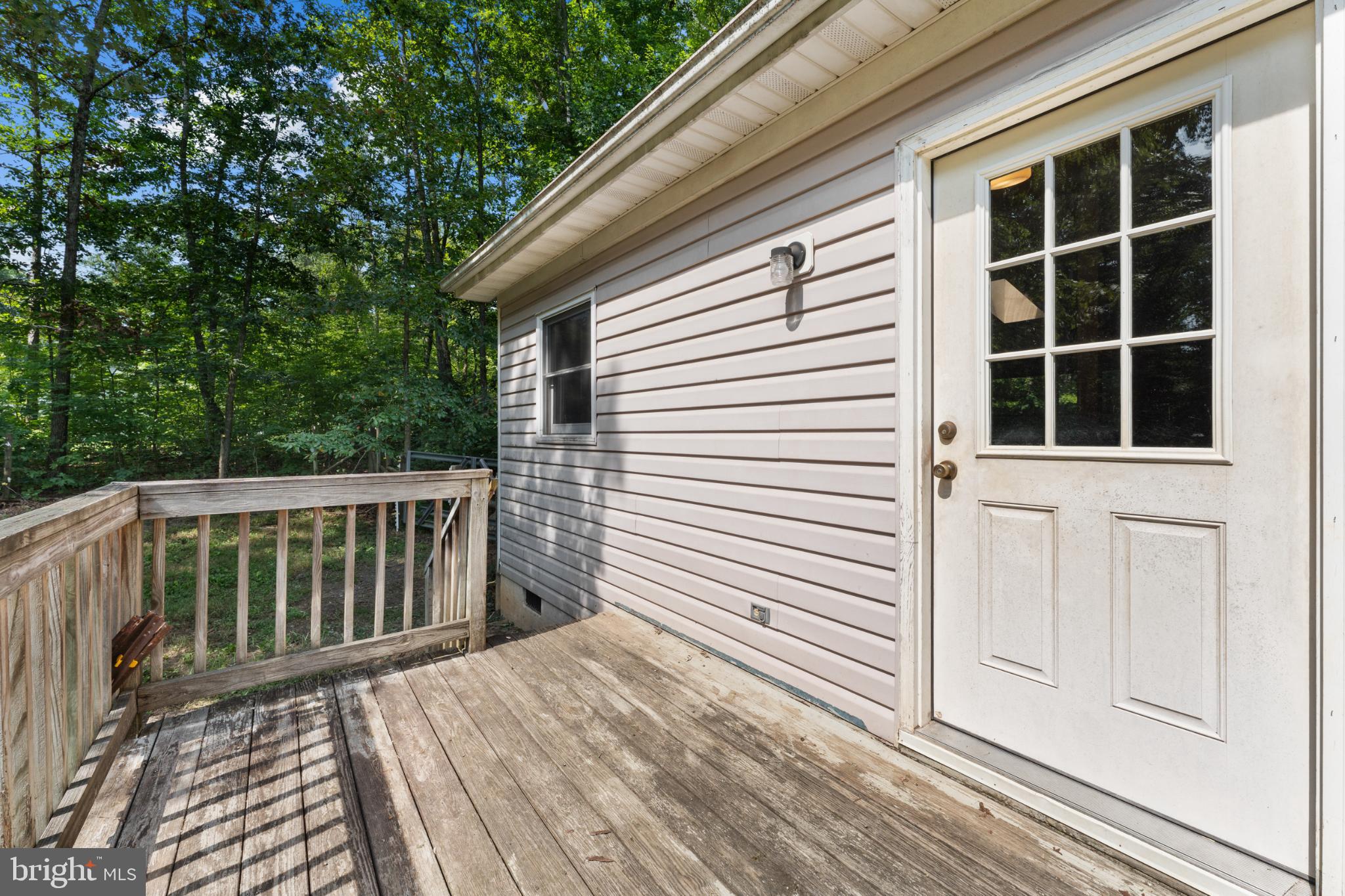 13175 Tower Road Unionville, VA 22567 - Photo 27 of 37 Charming deck with serene woodland views.