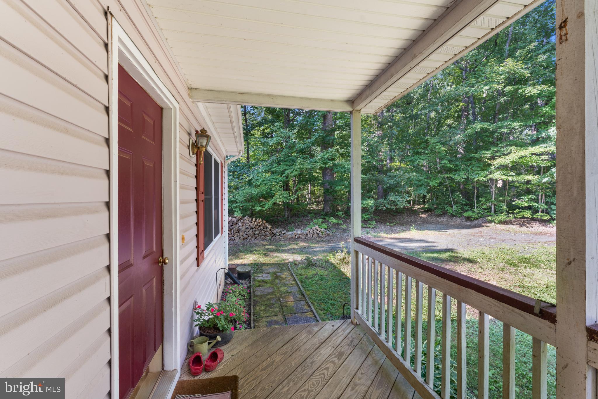 13175 Tower Road Unionville, VA 22567 - Photo 7 of 37 Welcoming porch with serene woodland views.