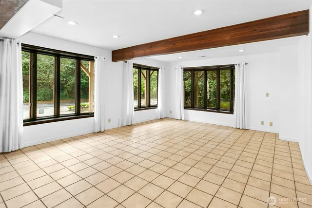 a view of an empty room and window