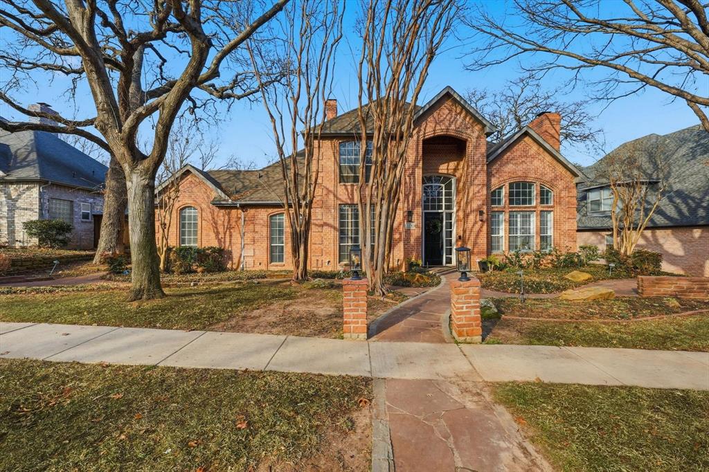 a front view of a house with street