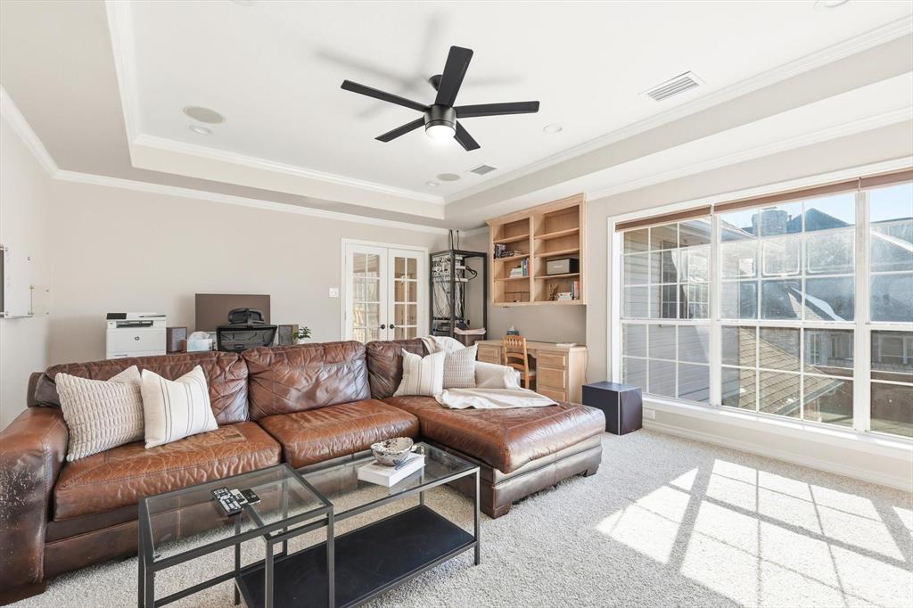 117 Sand Point Court Coppell, TX 75019 - Photo 24 of 40 a living room with furniture and a large window