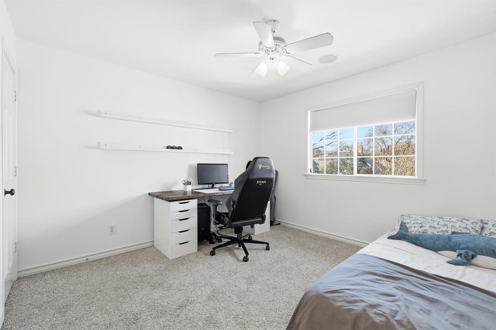 117 Sand Point Court Coppell, TX 75019 - Photo 28 of 40 a bedroom with a workspace