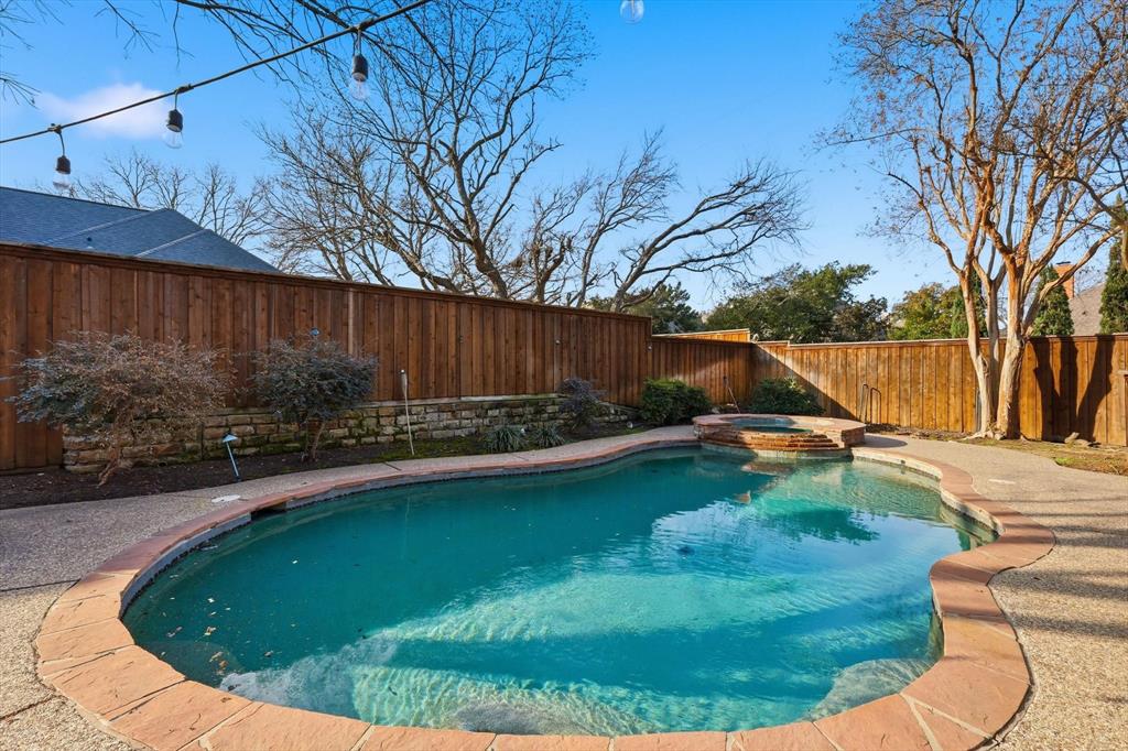 117 Sand Point Court Coppell, TX 75019 - Photo 35 of 40 a view of a backyard with plants and a patio