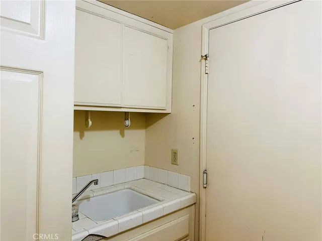 a bathroom with a sink and tub