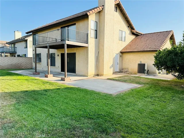 a view of a house with a swimming pool