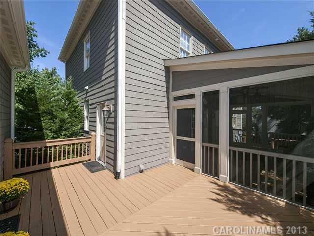 810 Millbrook Road Charlotte, NC 28211 - Photo 14 of 16 a view of a house with backyard and wooden deck