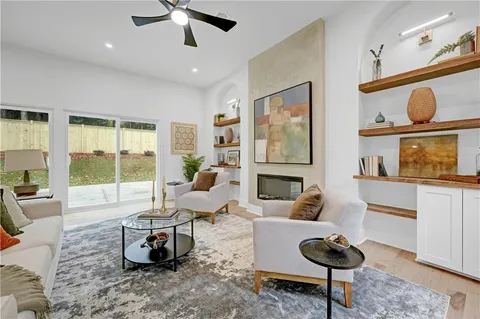a living room with furniture and a window