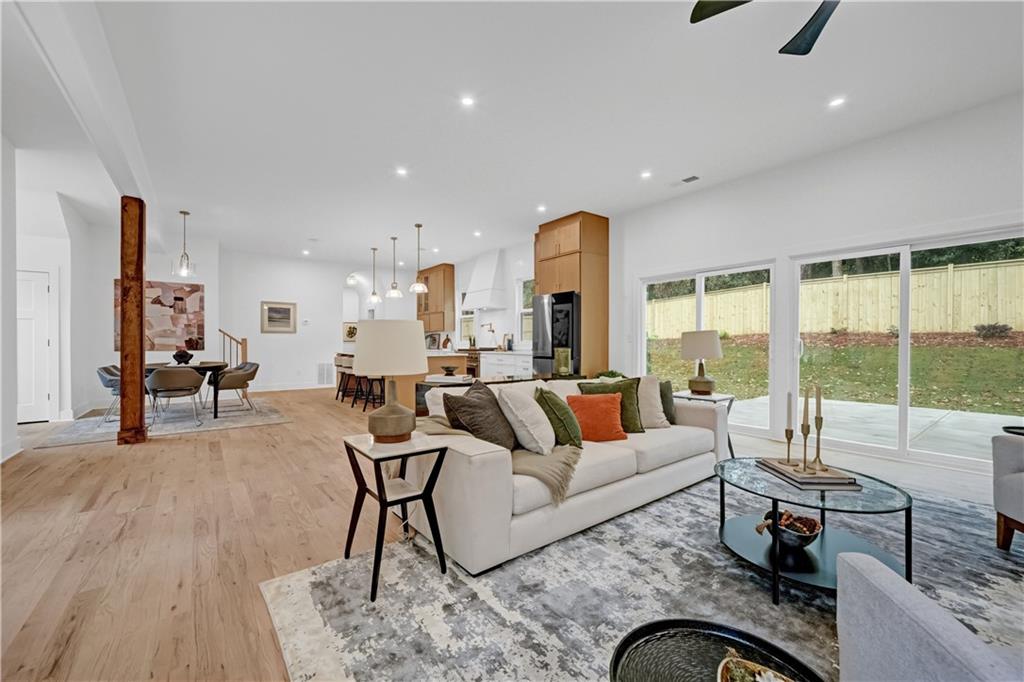 2893 Lavista Road Decatur, GA 30033 - Photo 17 of 37 a living room with furniture and a large window