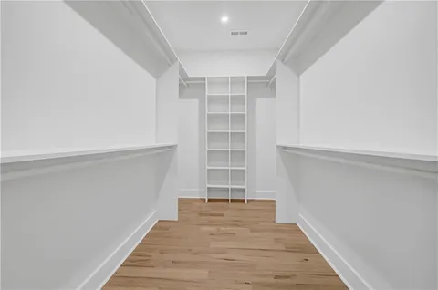 a view of an empty walk in closet