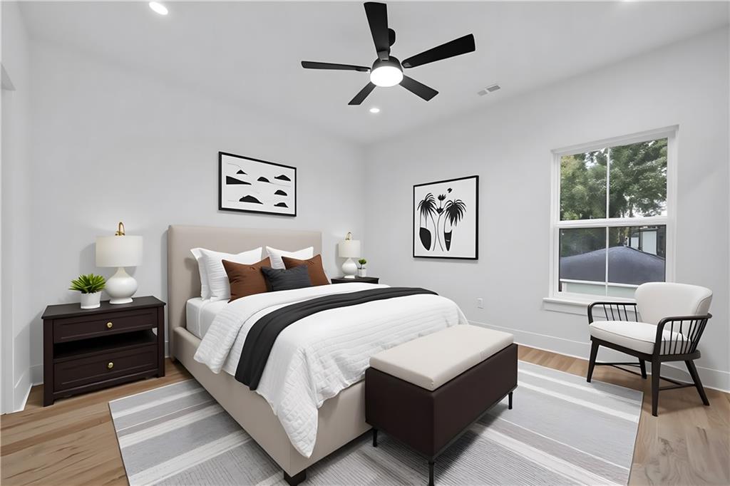 2893 Lavista Road Decatur, GA 30033 - Photo 32 of 37 a bedroom with a bed and a desk