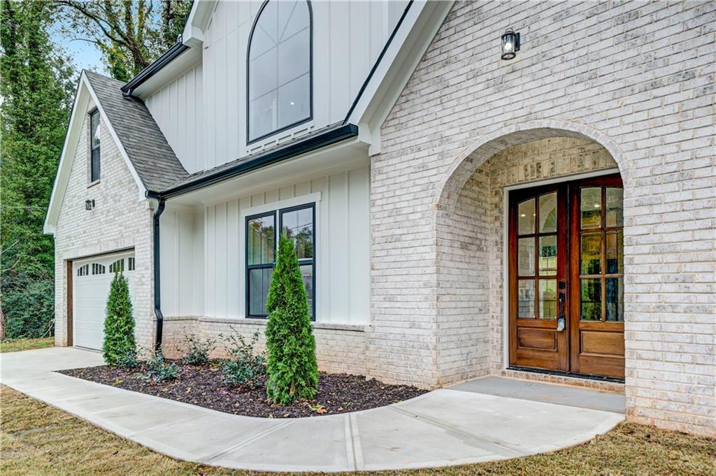 2893 Lavista Road Decatur, GA 30033 - Photo 4 of 37 a front view of a house with garden