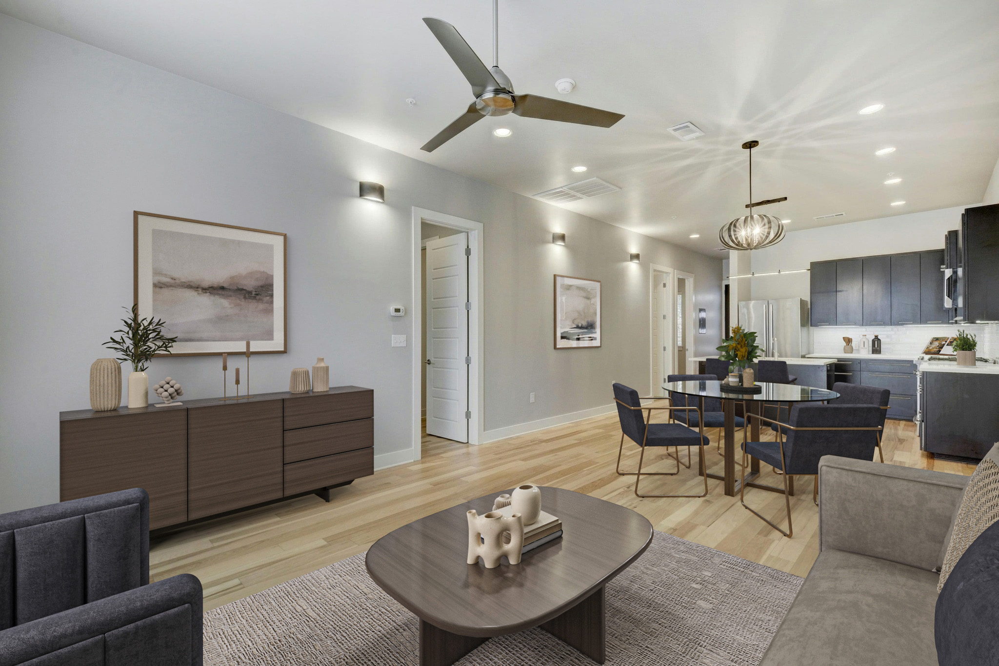 2314 Enfield Road, Unit 202 Austin, TX 78703 - Photo 2 of 20 The high ceilings are a RARE find for a condo in Tarrytown. Blonde hardwood flooring unites this open-concept living space, illuminated by recessed, modern and pendant lighting.