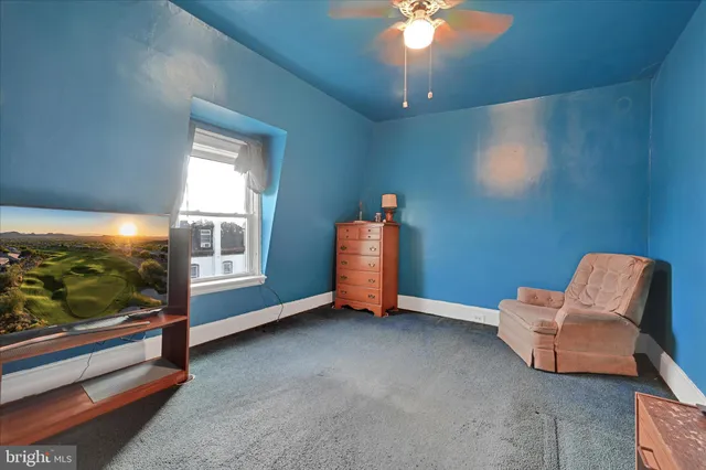 a room with furniture and window