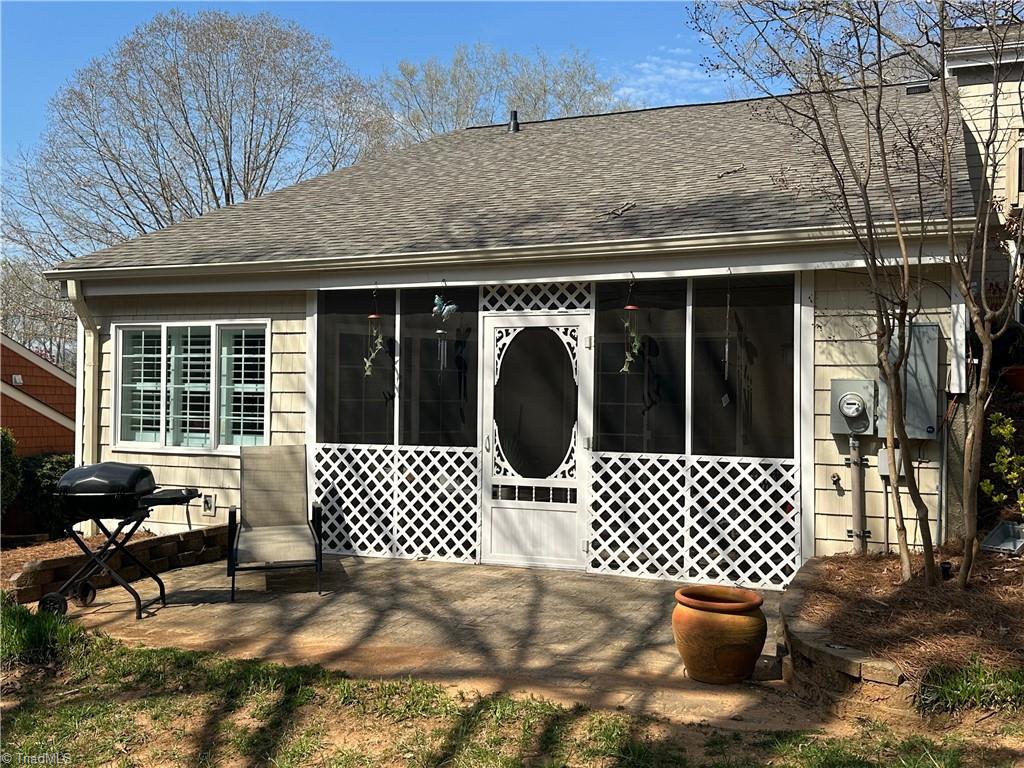 162 Golfview Drive Bermuda Run, NC 27006 - Photo 25 of 27 Back patio off the screened porch