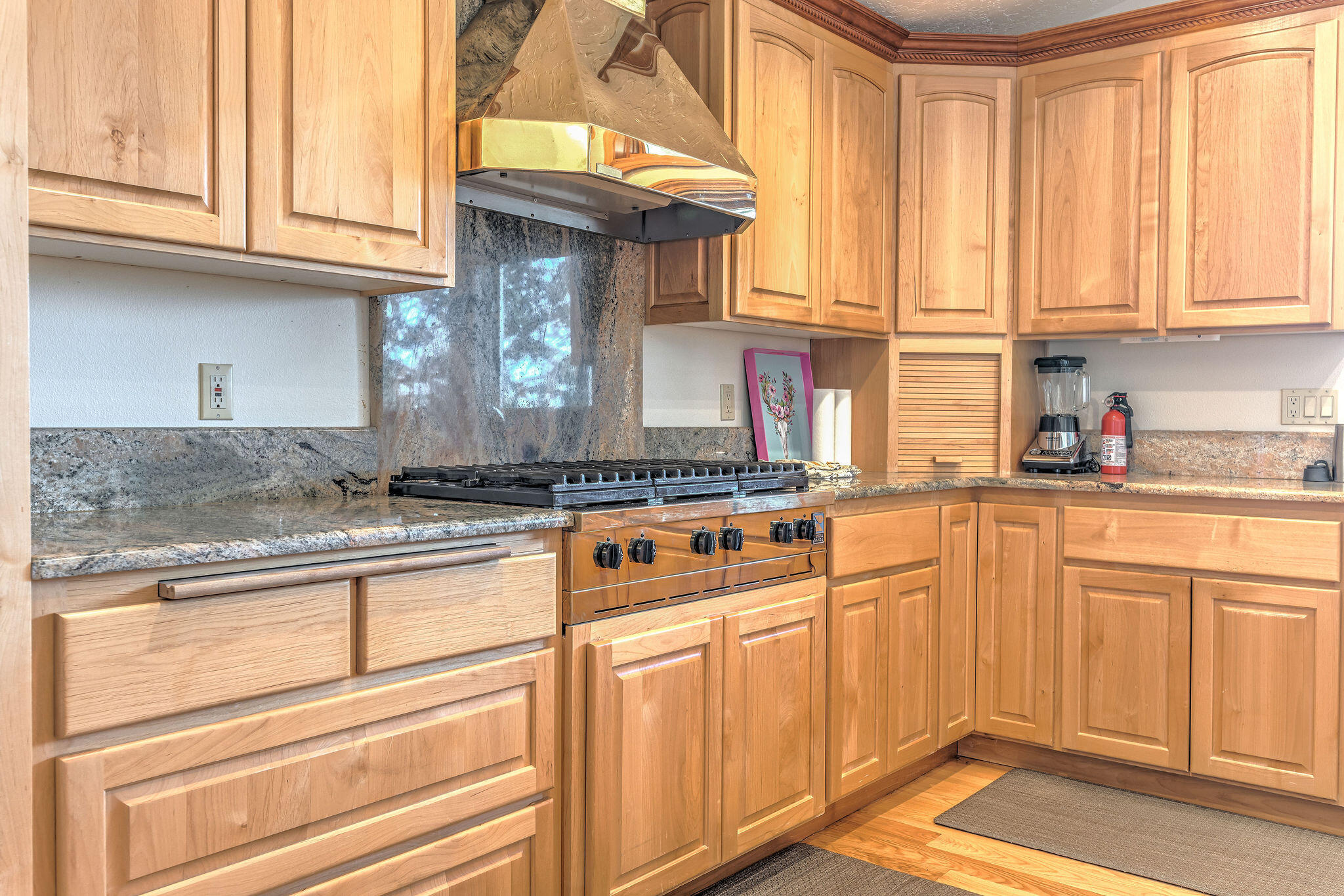 60975 Billadeau Road Bend, OR 97702 - Photo 22 of 65 a kitchen with stainless steel appliances granite countertop a sink and cabinets