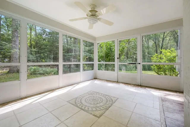 a view of a room with a large window